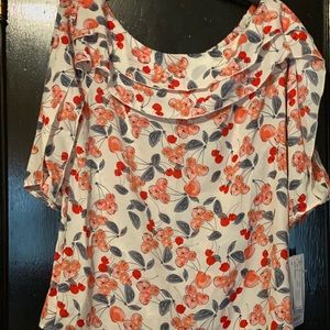 Fun summer women’s blouse.  New with tags!